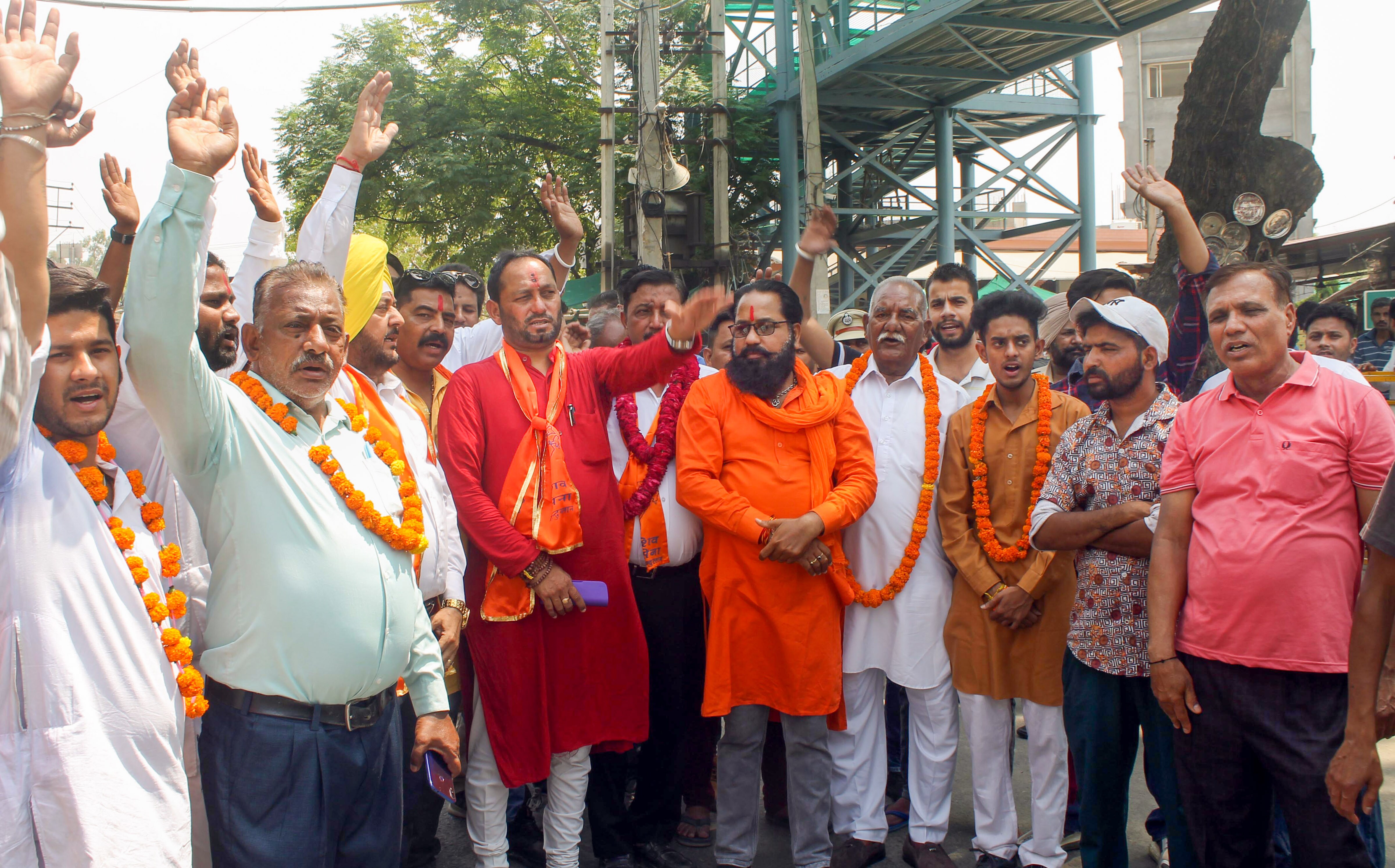 Shiv Sena (Hindustan) national president Pawan Kumar Gupta outside Kali Mata temple, a day after clashes broke out between two groups, in Patiala, Saturday, April 30, 2022. (PTI Photo) Shiv Sena (Hindustan) national president Pawan Kumar Gupta outside Kali Mata temple, a day after clashes broke out between two groups, in Patiala, Saturday, April 30, 2022. (PTI Photo)
