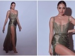 Kiara Advani sure knows how to make jaws drop in stylish designer fits. The actor recently graced the GQ Awards wearing an olive green body-fitted dress featuring a thigh-high slit. The outfit is by the international clothing line Aadnevik.(Instagram/@kiaraaliaadvani)