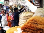 People purchase vermicelli outside Jama Masjid ahead of the Eid al-Fitr festival, in New Delhi on Sunday. (ANI Photo) People purchase vermicelli outside Jama Masjid ahead of the Eid al-Fitr festival, in New Delhi on Sunday. (ANI Photo)