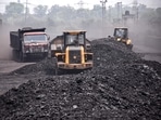 Ranchi: Labourers carry coal onto goods train at Ashoka Coal Mines in Peeparwar, amid a power crisis due to shortage of coal, about 70 Kms from Ranchi, Saturday, April 30, 2022.  (PTI Photo)
(PTI04_30_2022_000180B)