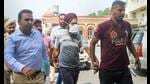 Barjinder Singh Parwana, the main accused in the Patiala violence case, being taken to Mata Kaushalya Hospital for his medical test, in Patiala on Sunday. (PTI) Barjinder Singh Parwana, the main accused in the Patiala violence case, being taken to Mata Kaushalya Hospital for his medical test, in Patiala on Sunday. (PTI)