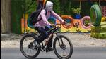 A man shields his face from the heat with a cloth while riding a bicycle, in New Delhi, Sunday, May 1, 2022. (PTI Photo/Manvender Vashist) A man shields his face from the heat with a cloth while riding a bicycle, in New Delhi, Sunday, May 1, 2022. (PTI Photo/Manvender Vashist)