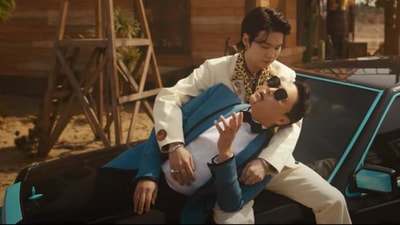 A still from PSY and Suga's That That music video.
