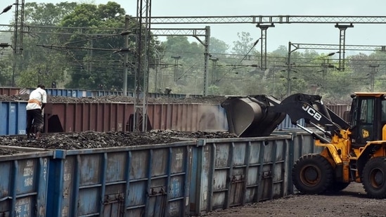 Coal being loaded in good train amid a power crisis due to shortage of coal, at Rai Coal mines in Peeparwar.(ANI Photo)