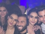 Nysa Devgan and Mahikaa Rampal with friends at a party.