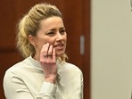 Amber Heard looks on during a trial in the Fairfax County Circuit Courthouse in Fairfax, Virginia (Photo by JIM WATSON / POOL / AFP)(AFP) Amber Heard looks on during a trial in the Fairfax County Circuit Courthouse in Fairfax, Virginia (Photo by JIM WATSON / POOL / AFP)(AFP)