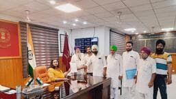 Farmers submit a memorandum to the deputy commissioner, Amrit Singh, in Ferozepur on Tuesday. They demanded higher compensation for their land that is being acquired for the proposed Ferozepur-Patti rail line. (HT Photo)