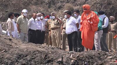 An NGT team visiting the Ludhiana landfill after a fire in April. The PPCB has imposed the fine citing the failure of urban local bodies in Punjab to comply with NGT orders. (HT File Photo) An NGT team visiting the Ludhiana landfill after a fire in April. The PPCB has imposed the fine citing the failure of urban local bodies in Punjab to comply with NGT orders. (HT File Photo)