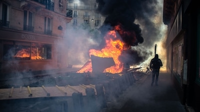 Most were peaceful but violence broke out in the capital, where police arrested 54 people, including a woman who attacked a fireman trying to put out a fire, Interior Minister Gerald Darmanin said on Twitter. Eight police were injured, he added. (AFP) Most were peaceful but violence broke out in the capital, where police arrested 54 people, including a woman who attacked a fireman trying to put out a fire, Interior Minister Gerald Darmanin said on Twitter. Eight police were injured, he added. (AFP)