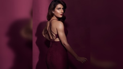 Fatima Sana Shaikh's outfit has halter straps, cut-out detail around the side of her waist and a slit that goes up to her thighs. (Instagram/@fatimasanashaikh)