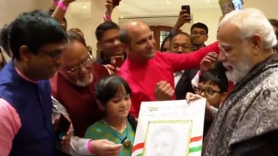 A young girl also welcomed PM Modi with his handmade portrait. (ANI) A young girl also welcomed PM Modi with his handmade portrait. (ANI)