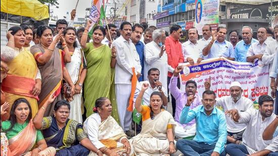 The Congress stepped up protests against the Bommai government after Santosh K Patil, a contractor, was found dead, weeks after he made allegations that he was being harassed by then rural development and panchayat raj minister KS Eshwarappa to cough up 40% commission for works of <span class='webrupee'>₹</span>4 crore done in Hindalga village of Belagavi district. (PTI) The Congress stepped up protests against the Bommai government after Santosh K Patil, a contractor, was found dead, weeks after he made allegations that he was being harassed by then rural development and panchayat raj minister KS Eshwarappa to cough up 40% commission for works of <span class='webrupee'>₹</span>4 crore done in Hindalga village of Belagavi district. (PTI)