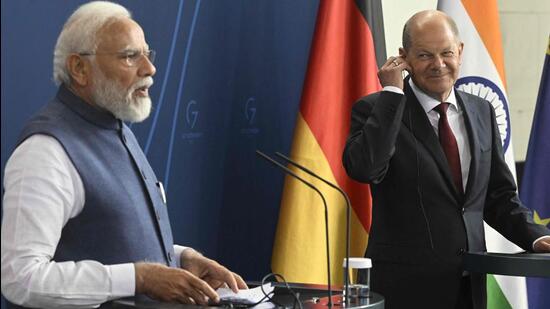 German Chancellor Olaf Scholz and Indian Prime Minister Narendra Modi attend a news conference during the German-Indian government consultations at the Chancellery in Berlin (AFP)