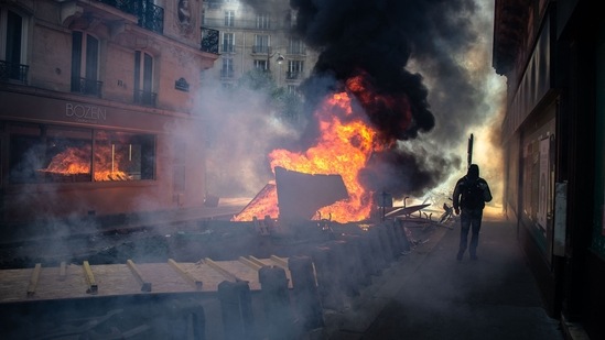 Most were peaceful but violence broke out in the capital, where police arrested 54 people, including a woman who attacked a fireman trying to put out a fire, Interior Minister Gerald Darmanin said on Twitter. Eight police were injured, he added.(AFP)
