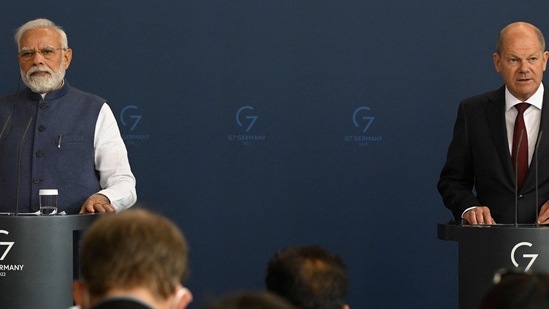 Prime Minister Narendra Modi and German Chancellor Olaf Scholz address a press conference following Indo-German governmental consultations at the Chancellery in Berlin on Monday.(AFP)