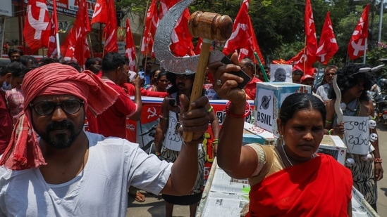 Members of Centre of India Trade Unions (CITU) take out a rally to mark May Day in Hyderabad, India.(AP)
