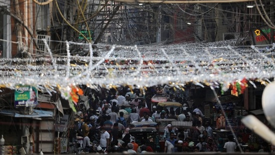People gather at a market ahead of the Eid al-Fitr festival, which marks the end of the Muslim fasting month of Ramadan, in the old quarter of Delhi on Sunday.(REUTERS)
