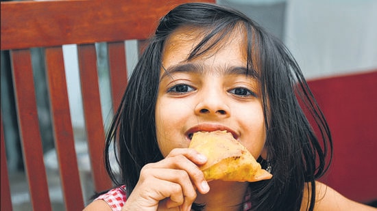 “Fact is, children love vada pavs and samosas and even if schools stop selling these, it is very easily available outside. We need better parental control on such matters, and only when parents and school team up will such menace be stopped,” the principal of a suburban school said. (Shutterstock)