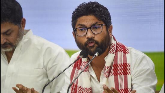 Independent MLA Jignesh Mevani addresses a press conference at the AICC headquarters, in New Delhi, Monday. (PTI PHOTO.)