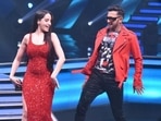 Terence Lewis and Nora Fatehi on the sets of India’s Best Dancer. Terence Lewis and Nora Fatehi on the sets of India’s Best Dancer.
