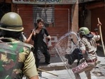 Police charge a miscreant to maintain peace after clashes broke out between two communities on Eid-ul-Fitr, in Jalori Gate area, in Jodhpur, Tuesday, May 3, 2022. (PTI Photo) Police charge a miscreant to maintain peace after clashes broke out between two communities on Eid-ul-Fitr, in Jalori Gate area, in Jodhpur, Tuesday, May 3, 2022. (PTI Photo)