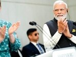 Prime Minister Narendra Modi (right) and his Danish counterpart Mette Frederiksen applaud during their joint press conference at the prime minister's official residence Marienborg, in Kongens Lyngby, north of Copenhagen, Denmark, Tuesday, May 3, 2022. (Martin Sylvest/Ritzau Scanpix via AP)