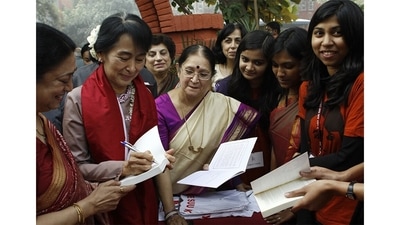 Then Myanmar opposition leader and National League for Democracy Chairperson Aung San Suu Kyi seen with college students at her alma mater Lady Sri Ram College, on November 16, 2012. (Vipin Kumar / HT Archive) Then Myanmar opposition leader and National League for Democracy Chairperson Aung San Suu Kyi seen with college students at her alma mater Lady Sri Ram College, on November 16, 2012. (Vipin Kumar / HT Archive)
