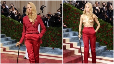 Cara Delevingne is not afraid of experimenting with her looks. The actor showed up to the event in a red Dior Haute Couture suit featuring a tail but quickly surprised everyone by removing her jacket and revealing her naked torso covered in shimmering gold body paint. (REUTERS)