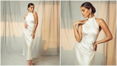 Tara Sutaria and Tiger Shroff's film Heropanti 2 has hit theatreson April 29. For her film screening, the actor kept it chic in a halter-neck satin dress and low bun. (Instagram/@tarasutaria)