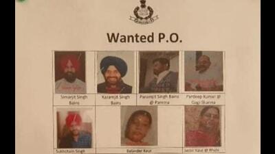 One of the posters put up in the Shimlapuri area of Ludhiana on Tuesday. Apart from the photo of former MLA Simarjeet Singh Bains, the poster has pictures of his brothers and aides, including two women, who are co-accused in the case. (HT Photo)