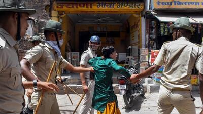 Jodhpur: Police take away a miscreant after clashes broke out between two communities on Eid-ul-Fitr, in Jalori Gate area, in Jodhpur, Tuesday (PTI) Jodhpur: Police take away a miscreant after clashes broke out between two communities on Eid-ul-Fitr, in Jalori Gate area, in Jodhpur, Tuesday (PTI)