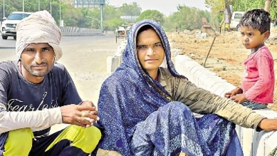 Ravi, Bharati and their son.