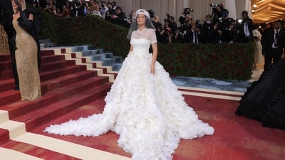 Kylie Jenner astonished everyone with her Gen Z bridal avatar. The 24-year-old donned an off-white wedding dress, which was complete with a veil and billowing skirt. The main attraction of her outfit was the veil on her head which was attached to a backwards-facing baseball hat. (REUTERS)