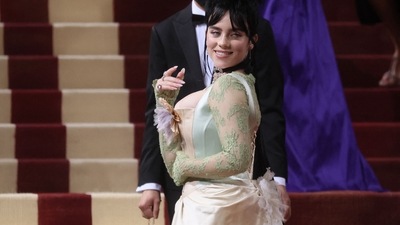 Billie Eilish went with an upcycled green lace-trim dress from Gucci and Cynthia Erivo wore sheer white Louis Vuitton with a matching headpiece. (REUTERS)