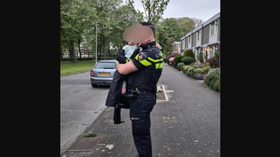 The image shows the boy with a cop whom police dubbed as ‘new Max Verstappen’ after he took his mom's car on a joyride, (Instagram/@politie_utrechtnoord)