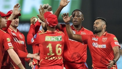 Kagiso Rabada of Punjab Kings celebrates with teammates, after taking the wicket of Wriddhiman Saha of Gujarat Titans (PTI) Kagiso Rabada of Punjab Kings celebrates with teammates, after taking the wicket of Wriddhiman Saha of Gujarat Titans (PTI)