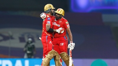 Mumbai: Shikhar Dhawan of Punjab Kings celebrates with teammate, after scoring a half-century during the 48th T20 cricket match of the Indian Premier League 2022 (IPL season 15) between the Gujarat Titans and the Punjab Kings, at the DY Patil Stadium in Mumbai, Tuesday, May 3, 2022. (Sportzpics for IPL/PTI Photo)(PTI05_03_2022_000427A) (PTI) Mumbai: Shikhar Dhawan of Punjab Kings celebrates with teammate, after scoring a half-century during the 48th T20 cricket match of the Indian Premier League 2022 (IPL season 15) between the Gujarat Titans and the Punjab Kings, at the DY Patil Stadium in Mumbai, Tuesday, May 3, 2022. (Sportzpics for IPL/PTI Photo)(PTI05_03_2022_000427A) (PTI)