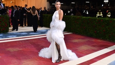 Model Hailey Baldwin Bieber aced the minimal fashion in a white silk Saint Laurent gown with a halter neckline and high slit. (AFP) Model Hailey Baldwin Bieber aced the minimal fashion in a white silk Saint Laurent gown with a halter neckline and high slit. (AFP)