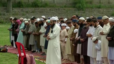 Devotees offer Namaz in Srinagar, Jammu and Kashmir, on Eid-al-Fitr. The festival is celebrated by feasting, praying, family gatherings, exchanging gifts, and helping the needy. (ANI)