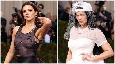 Kendall Jenner with bleached brows, Kylie in wedding dress with baseball cap have a Yin-Yang reunion at Met Gala 2022 (Reuters) Kendall Jenner with bleached brows, Kylie in wedding dress with baseball cap have a Yin-Yang reunion at Met Gala 2022 (Reuters)