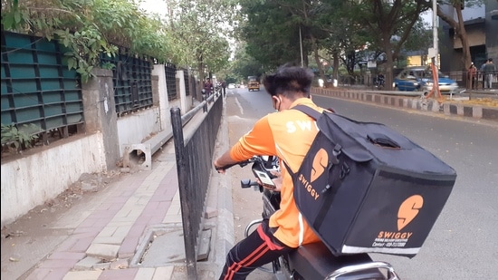 Food delivery persons are now demanding an increase in commission after fuel price hike. (Aaryaman Dahiya/HT PHOTO)