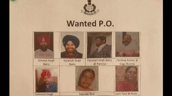 One of the posters put up in the Shimlapuri area of Ludhiana on Tuesday. Apart from the photo of former MLA Simarjeet Singh Bains, the poster has pictures of his brothers and aides, including two women, who are co-accused in the case. (HT Photo)