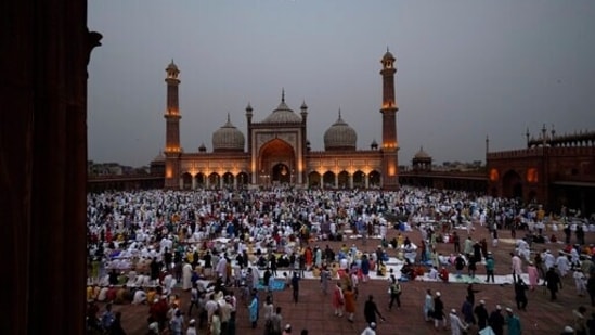 People gather to offer Eid al-Fitr prayers at the Jama Masjid in New Delhi on May 3, 2022. The Eid al-Fitr festival marks the end of the fasting month of Ramadan and lasts for three days.(AP Photo/Manish Swarup)