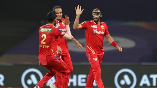 Rishi Dhawan of Punjab Kings celebrates with teammates, after taking the wicket of Hardik Pandya, captain of Gujarat Titans(PTI)