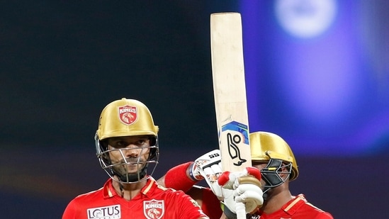 Shikhar Dhawan of Punjab Kings celebrates after scoring a half-century during the 48th T20 cricket match of the Indian Premier League 2022(PTI)