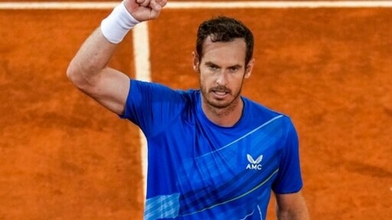 Andy Murray, of Britain, celebrates his victory over Dominic Thiem of Austria during their match at the Mutua Madrid Open tennis tournament in Madrid, Spain, Monday, May 2, 2022.(AP)