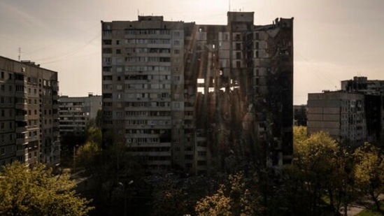 FILE - A building heavily damaged by multiple Russian bombardments stands near a frontline in Kharkiv, Ukraine (AP)