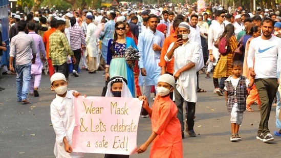 Young Muslim devotees hit the streets of Chandigarh to celebrate Eid the right way, abiding by the Covid-19 rules and wearing a mask even while offering prayers. (HT Photo/Keshav Singh)