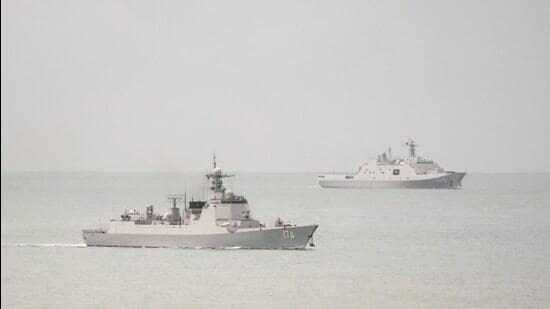 A PLA-N Luyang-class guided missile destroyer and a PLA-N Yuzhao-class amphibious transport dock vessel leave the Torres Strait and enter the Coral Sea. (REUTERS/FILE)
