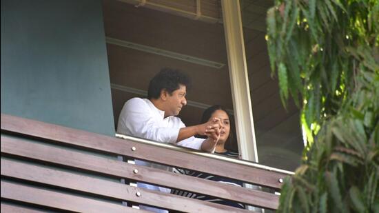 MNS chief Raj Thackeray with his daughter at his 'Shivteerth' residence in Mumbai on Tuesday. (PTI)